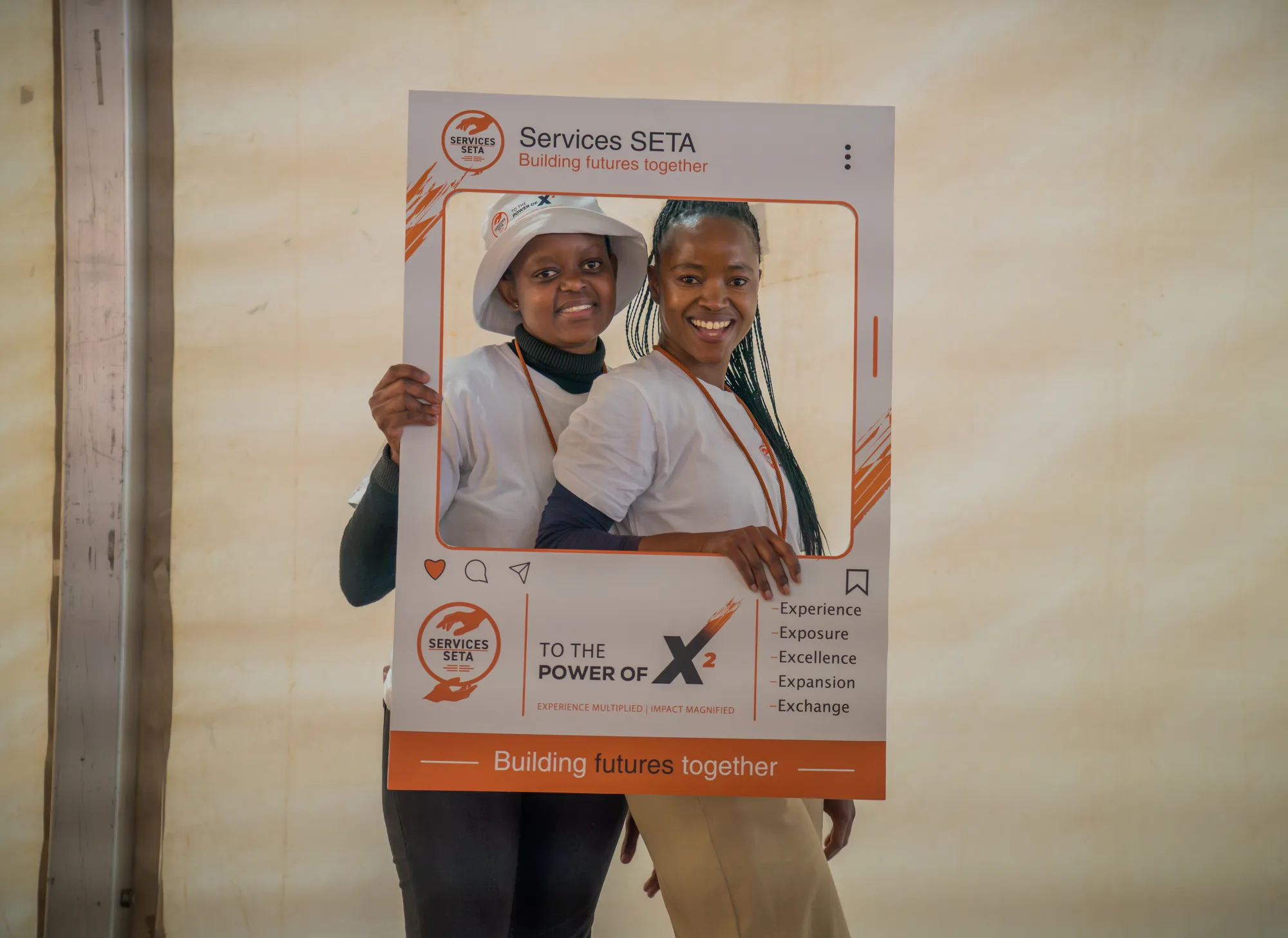 Two programme participants at a To The Power of X² event.